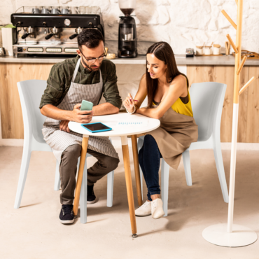 Spectre White Stacking Chairs in Cafe